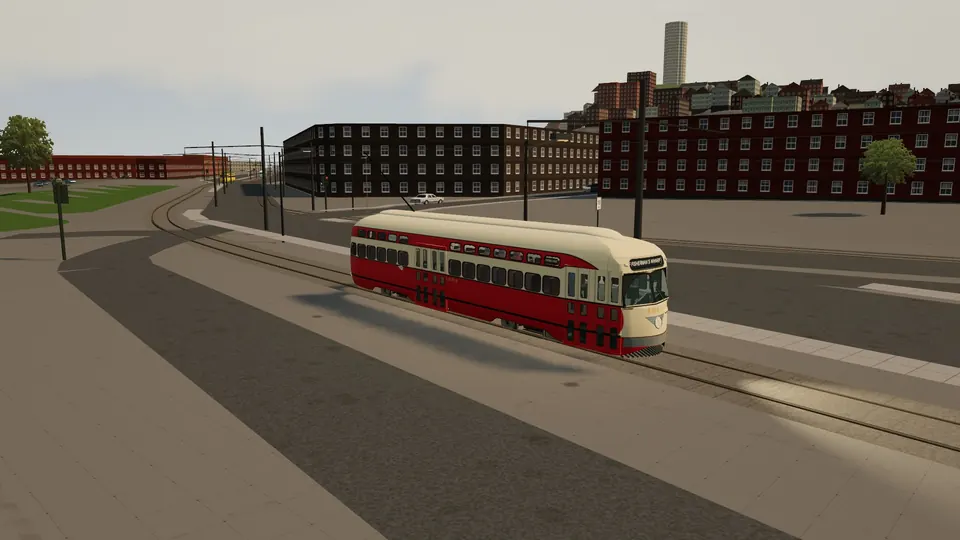 A PCC car in Pittsburgh Railways cream and red running along the San Francisco waterfront